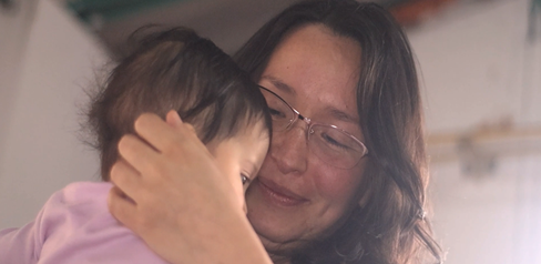 Carol con su hija.